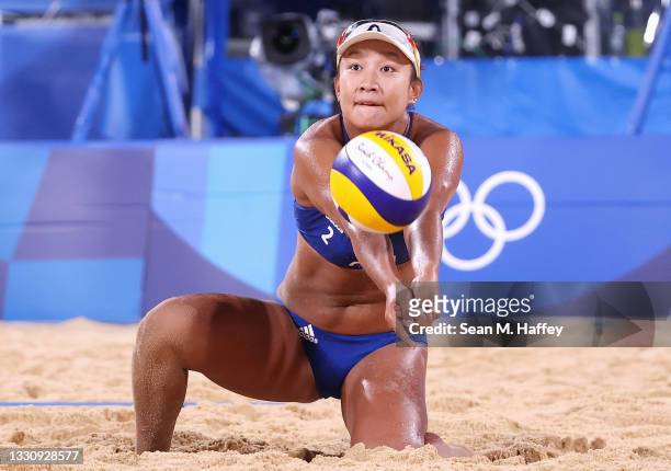 Xinyi Xia of Team China competes against Team Brazil during the Women's Preliminary - Pool C beach volleyball on day four of the Tokyo 2020 Olympic...