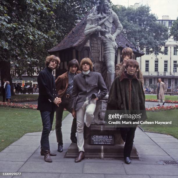 Group portrait of American folk rock band The Byrds in Soho Square, London, 1966. L-R Roger McGuinn, Gene Clark, Michael Clarke, Chris Hillman, David...