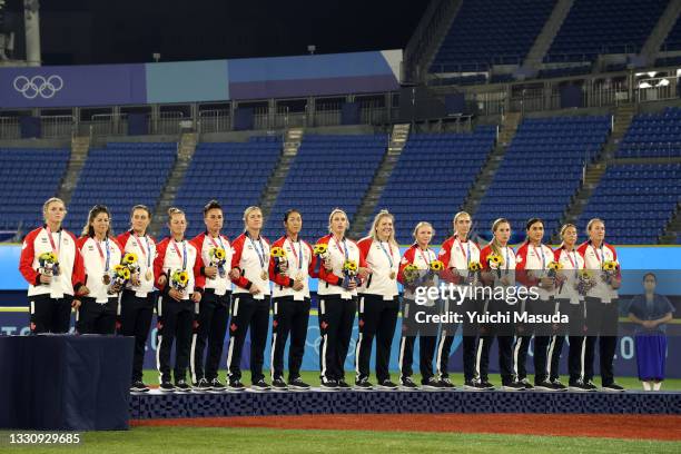 Team Canada receives their bronze medals following the Softball Gold Medal Game between Team Japan and Team United States on day four of the Tokyo...
