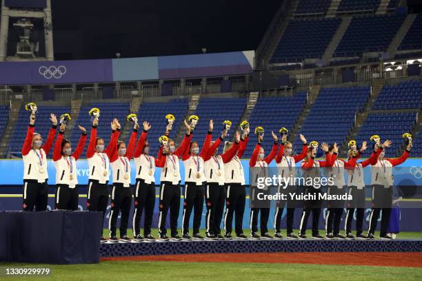 Team Canada receives their bronze medals following the Softball Gold Medal Game between Team Japan and Team United States on day four of the Tokyo...