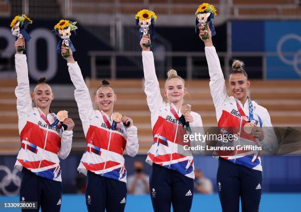 Team Great Britain celebrate on the podium after winning the bronze medal during the Women's Team Final on day four on day four of the Tokyo 2020...