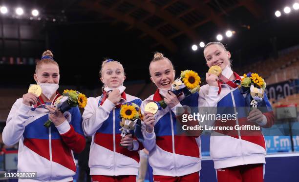 Team ROC celebrate with their Gold Medals after victory in the Women's Team Final on day four on day four of the Tokyo 2020 Olympic Games at Ariake...