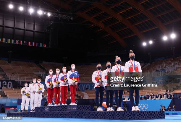 Team USA with Silver, Team ROC with Gold and Great Britain with Bronze during the medal ceremony in the Women's Team Final on day four on day four of...