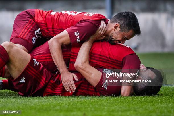 Rafa Lopes of Legia Warszawa celebrates his team's 1st goal with team mates during UEFA Champions League Second Qualifying Round Second Leg match...