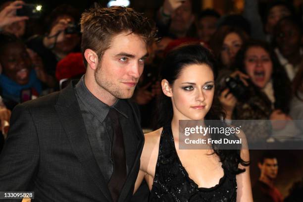 Robert Pattison and Kristen Stewart attend the UK premiere of The Twilight Saga: Breaking Dawn Part 1 at Westfield Stratford City on November 16,...