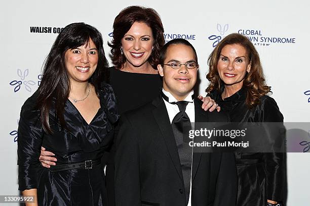 Michelle Sie Whitten, executive director of the Global Down Syndrome Foundation, CNN anchor Kyra Phillips, Alex Sessions and Lynda Erkiletian of...