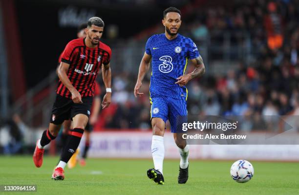 Lewis Baker of Chelsea passes the ball under pressure from Dominic Solanke of AFC Bournemouth during the Pre-Season Friendly match between AFC...