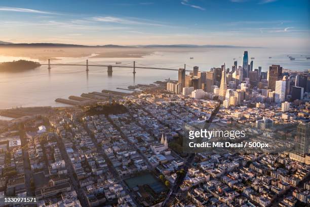 aerial view of cityscape against sky during sunset,san francisco,california,united states,usa - サンフランシスコベイエリア ストックフォトと画像