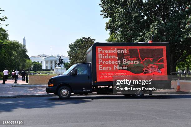 July 27: A mobile digital billboard truck moves through the city in front of the White House in support of Indigenous activists ramping up pressure...