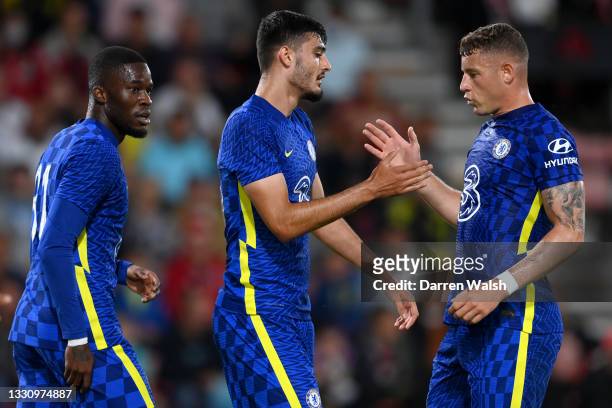 Armando Broja of Chelsea celebrates with teammate Ross Barkley after scoring their team's first goal during the Pre-Season Friendly between...