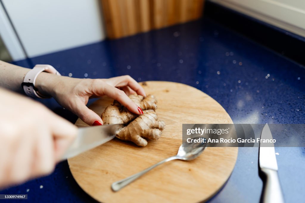 Cutting fresh ginger root