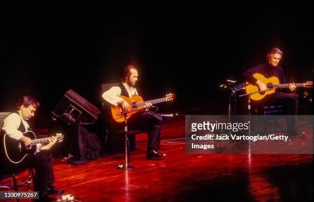 The members of Jazz and World Music group the Guitar Trio perform at Lincoln Center's Avery Fisher Hall, New York, New York, November 20, 1996....