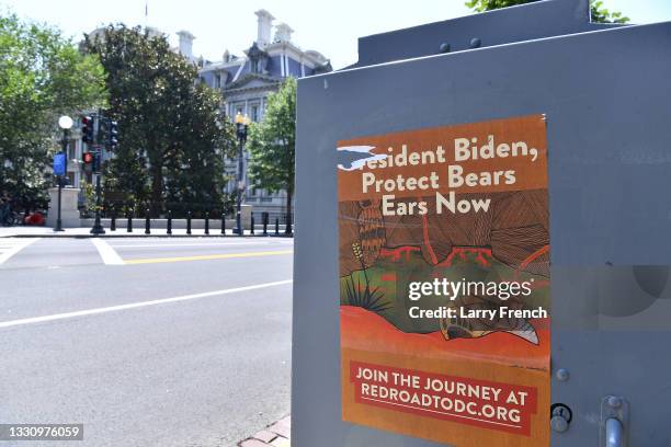 July 27: A poster on a power box is seen in front of the Eisenhower Executive Office Building in support of Indigenous activists ramping up pressure...