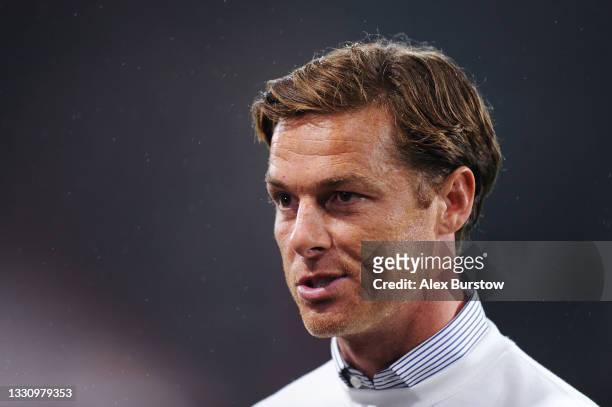 Scott Parker, Head Coach of AFC Bournemouth talks to the media as he is interviewed pitchside after the Pre-Season Friendly match between AFC...