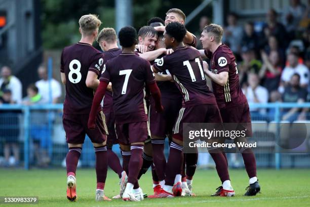 Sam Greenwood of Leeds United celebrates with Joseph Gelhardt and teammates after scoring their side's second goal during the Pre-Season Friendly...