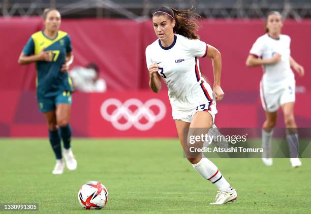 Alex Morgan of Team United States plays against Australia during the Women's Football Group G match on day four of the Tokyo 2020 Olympic Games at...