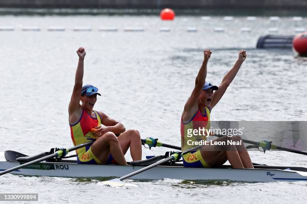 Ancuta Bodnar and Simona Radis of Team Romania celebrate winning the gold medal during the Women's Double Sculls Final A on day five of the Tokyo...
