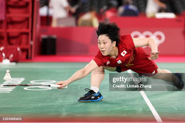 Akane Yamaguchi of Team Japan competes against Kirsty Gilmour of Team Great Britain during a Women’s Singles Group L match on day five of the Tokyo...