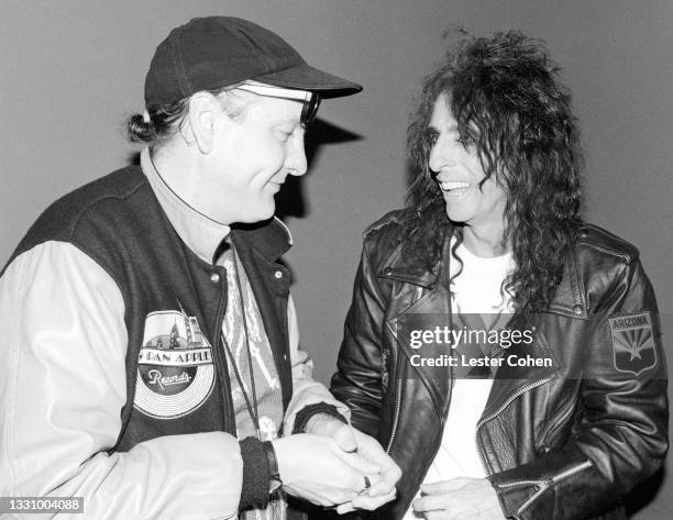 American musician, singer-songwriter Rick Nielsen, of the American rock band Cheap Trick talks to American singer, songwriter, and actor Alice Cooper...