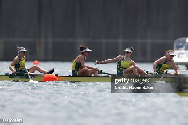 Lucy Stephan, Rosemary Popa, Jessica Morrison and Annabelle Mcintyre of Team Australia celebrate winning the gold medal during the Women's Four Final...