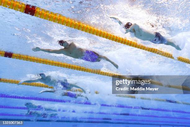 Sunwoo Hwang of Team South Korea, Caeleb Dressel of Team United States and Alessandro Miressi of Team Italy compete in the Men's 100m Freestyle...