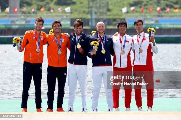 Silver medalists Melvin Twellaar and Stef Broenink of Team Netherlands, gold medalists Matthieu Androdias and Hugo Boucheron of Team France and...