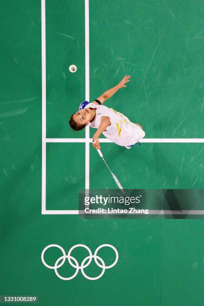 Nozomi Okuhara of Team Japan competes against Evgeniya Kosetskaya of Team ROC during a Women’s Singles Group E match on day five of the Tokyo 2020...