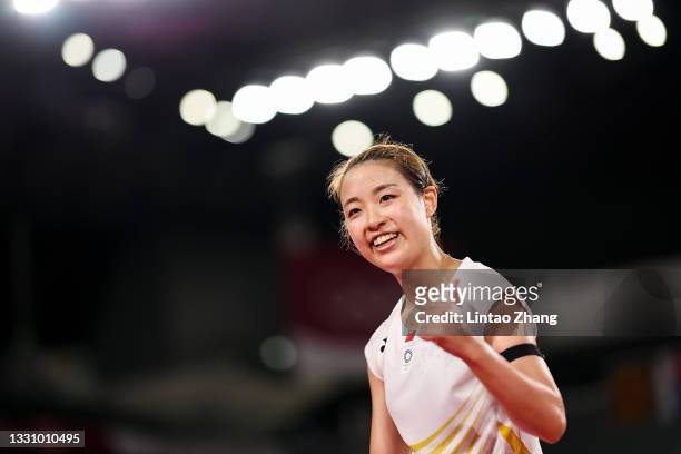 Nozomi Okuhara of Team Japan celebrates after her victory against Evgeniya Kosetskaya of Team ROC during a Women’s Singles Group E match on day five...