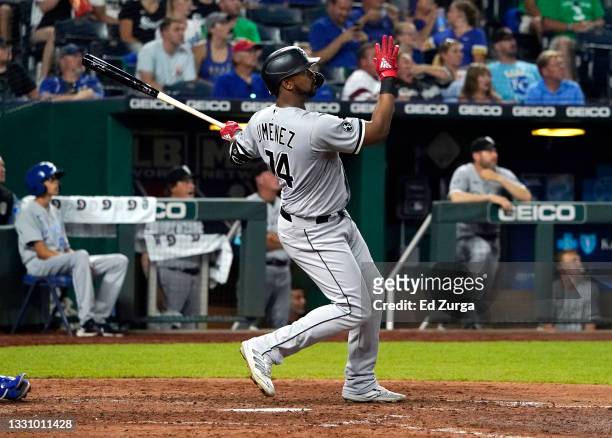 Eloy Jimenez of the Chicago White Sox hits a three-run home run in the eighth inning against the Kansas City Royals at Kauffman Stadium on July 27,...