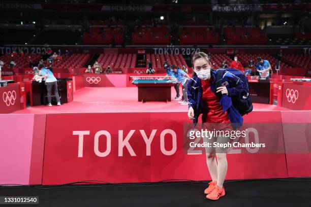Kasumi Ishikawa of Team Japan bows after losing her Women's Singles Quarterfinals table tennis match on day five of the Tokyo 2020 Olympic Games at...