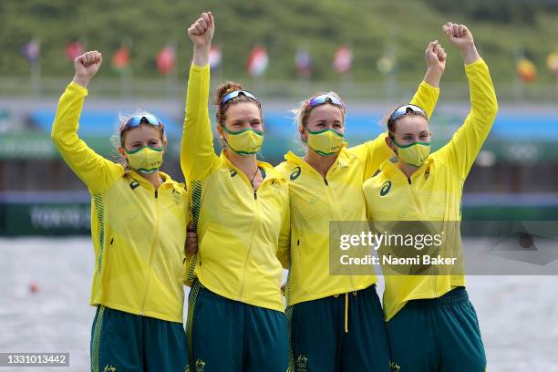 Bronze medalists Ria Thompson, Rowena Meredith, Harriet Hudson and Caitlin Cronin of Team Australia pose with their medals during the medal ceremony...