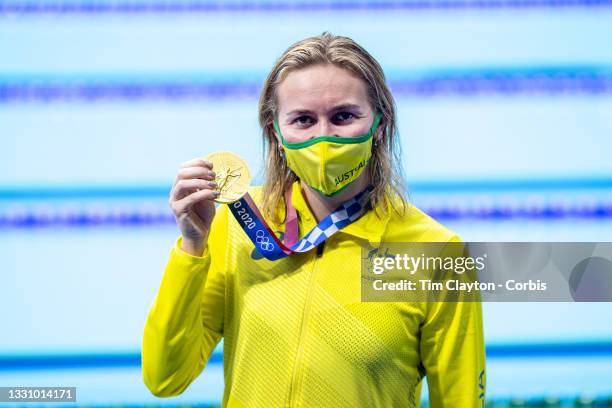 Ariarne Titmus of Australia holds her gold medal after winning the 200m freestyle for women during the Swimming Finals at the Tokyo Aquatic Centre at...