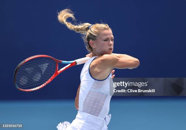 Camila Giorgi of Team Italy plays a forehand during her Women's Singles Quarterfinal match against Elina Svitolina of Team Ukraine on day five of the...