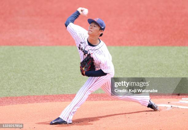 Pitcher Yoshinobu Yamamoto of Team Japan pitches in the first inning against Team Dominican Republic during the baseball opening round Group A game...