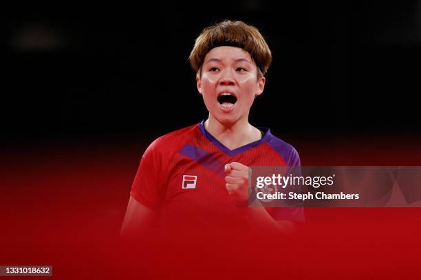 Doo Hoi Kem of Team Hong Kong reacts during her Women's Singles Quarterfinals table tennis match on day five of the Tokyo 2020 Olympic Games at Tokyo...