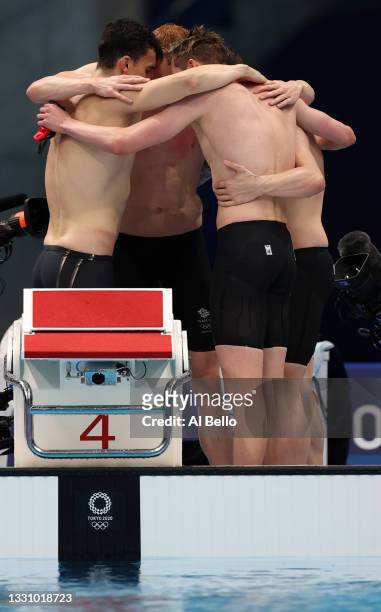 James Guy, Tom Dean, Duncan Scott and Matthew Richards of Team Great Britain celebrate after winning the gold medal in the Men's 4 x 200m Freestyle...