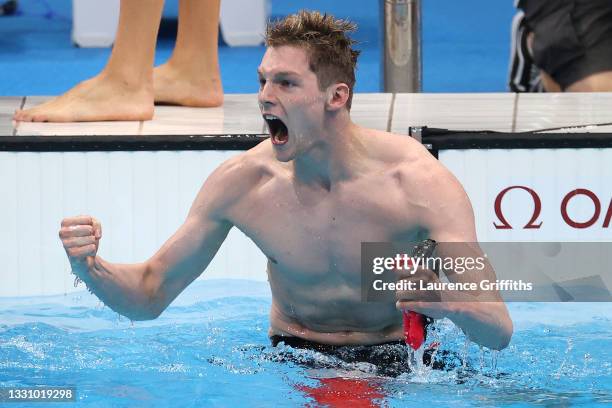 Duncan Scott of Team Great Britain reacts after competing in the Men's 4 x 200m Freestyle Relay Final on day five of the Tokyo 2020 Olympic Games at...