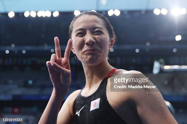 Yui Ohashi of Team Japan reacts after winning the gold medal for the Women's 200m Individual Medley Final on day five of the Tokyo 2020 Olympic Games...