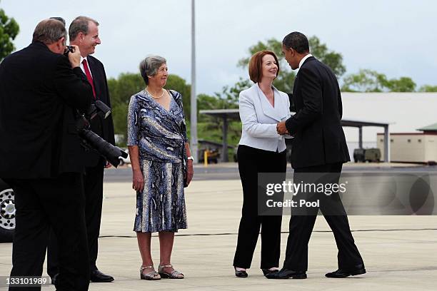 Australian Prime Minister Julia Gillard greets US President Barack Obama next to Northern Territory Administrator Sally Thomas and Chief Minister...