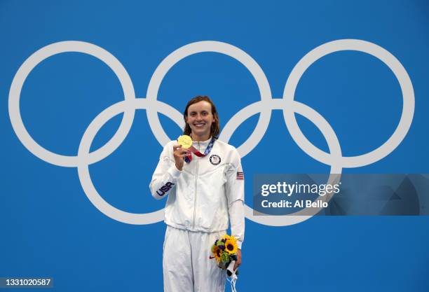 Katie Ledecky of Team United States poses with the gold medal during the medal ceremony for the Women’s 1500m Freestyle Final on day five of the...