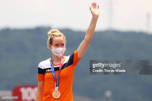 Anna van der Breggen of Team Netherlands poses with the bronze medal after the Women's Individual time trial on day five of the Tokyo 2020 Olympic...