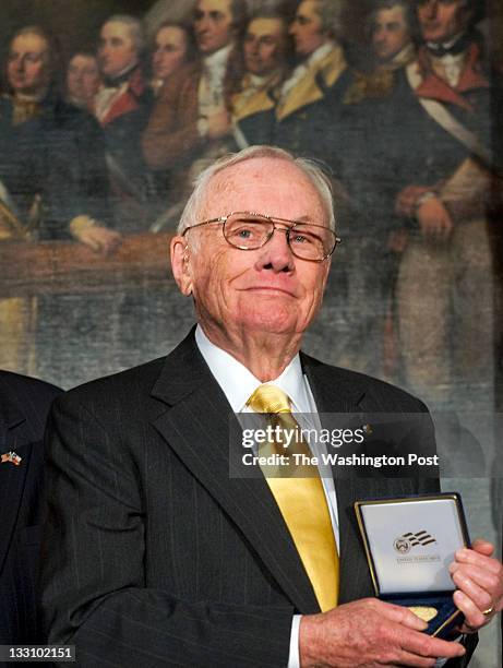 Washington, DC First man on the moon Neil Armstrong smiles after receiving his honors as House and Senate leaders hold a Congressional Gold Medal...