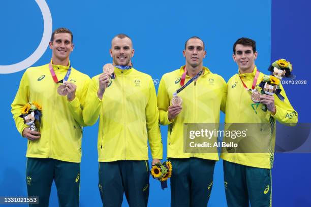 Alexander Graham, Kyle Chalmers, Zac Incerti and Thomas Neill of Team Australia celebrate during the medal ceremony for the Men's 4 x 200m Freestyle...