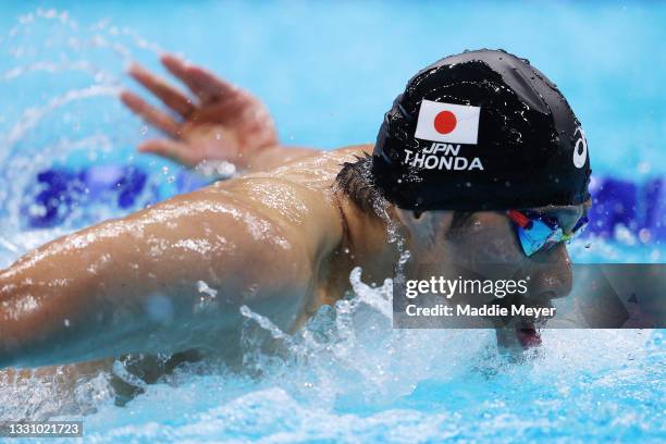 Tomoru Honda of Team Japan competes in the Men's 200m Butterfly Final on day five of the Tokyo 2020 Olympic Games at Tokyo Aquatics Centre on July...