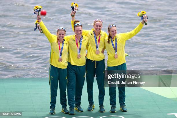 Bronze medalists Ria Thompson, Rowena Meredith, Harriet Hudson and Caitlin Cronin of Team Australia pose with their bronze medals during the medal...