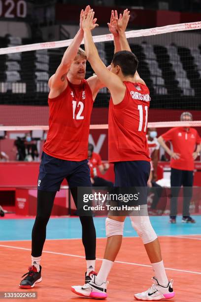 Maxwell Holt of Team United States celebrates with Micah Christenson after defeating Team Tunisia during the Men's Preliminary Round - Pool B...