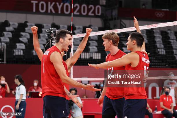 Team United States celebrates after defeating Team Tunisia during the Men's Preliminary Round - Pool B volleyball on day five of the Tokyo 2020...
