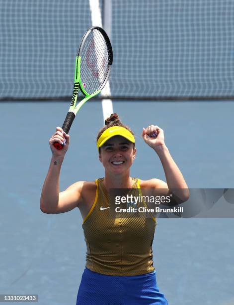 Elina Svitolina of Team Ukraine celebrates after match point during her Women's Singles Quarterfinal match against Camila Giorgi of Team Italy on day...