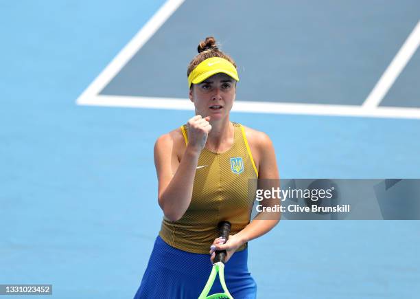 Elina Svitolina of Team Ukraine celebrates after a point during her Women's Singles Quarterfinal match against Camila Giorgi of Team Italy on day...