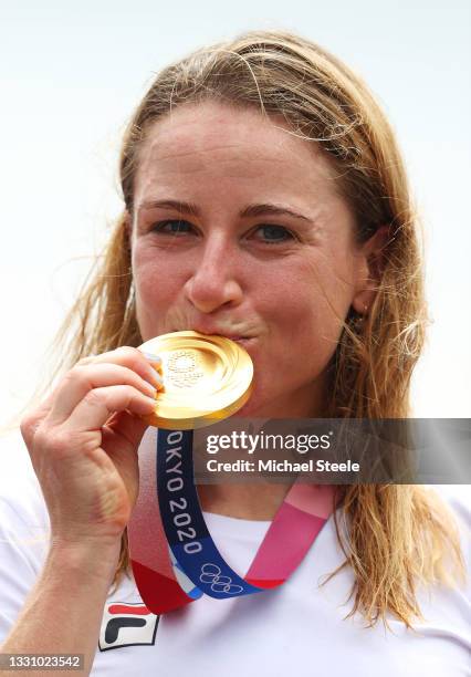 Annemiek van Vleuten of Team Netherlands kisses her gold medal after the Women's Individual time trial on day five of the Tokyo 2020 Olympic Games at...